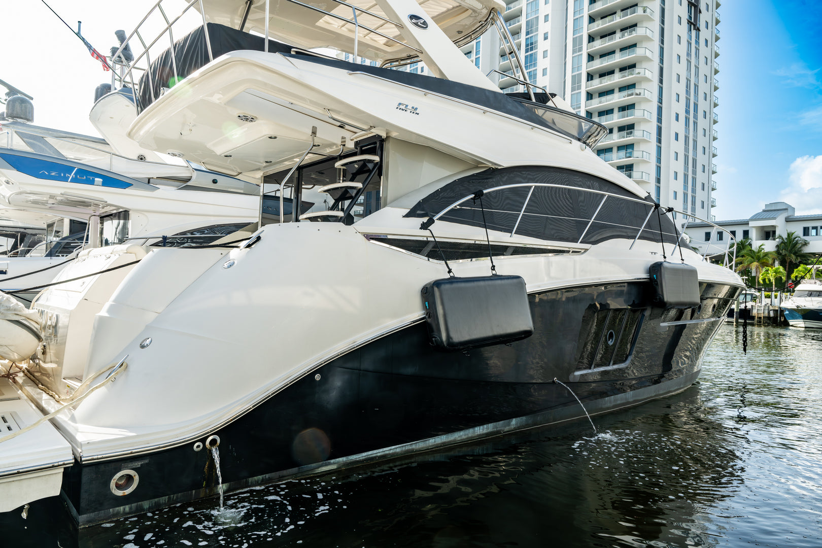 Fender seen from a wide perspective installed on a luxury boat
