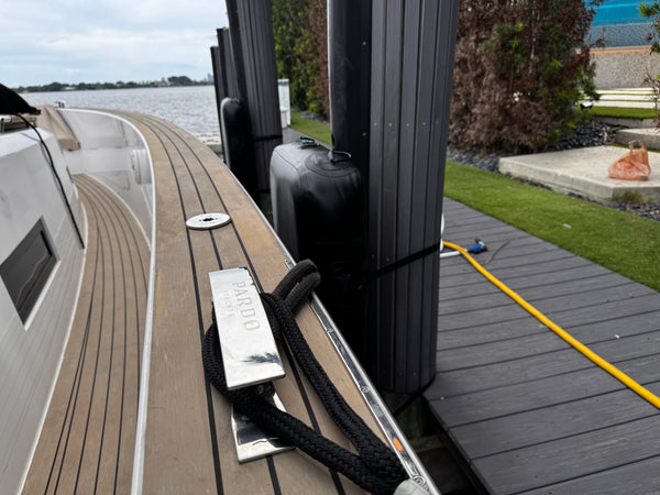 Fender installed on dock alongside premium vessel